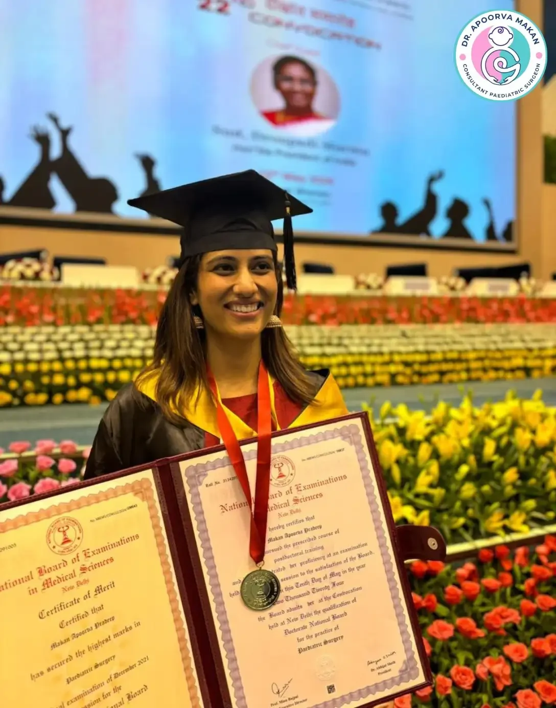 Dr. Apoorva Makan wearing gold medal and holding her post graduation pediatric surgery degree at convocation ceremony in Delhi.