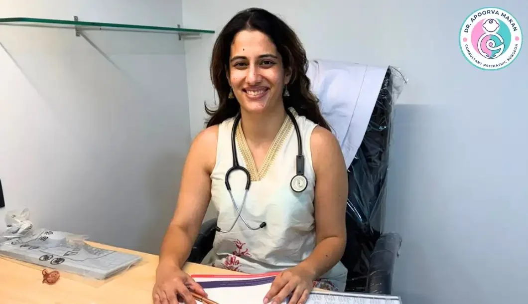 Child Surgeon for Orchidopexy in Pune - Dr. Apoorva Makan sitting at her pediatric surgery clinic.
