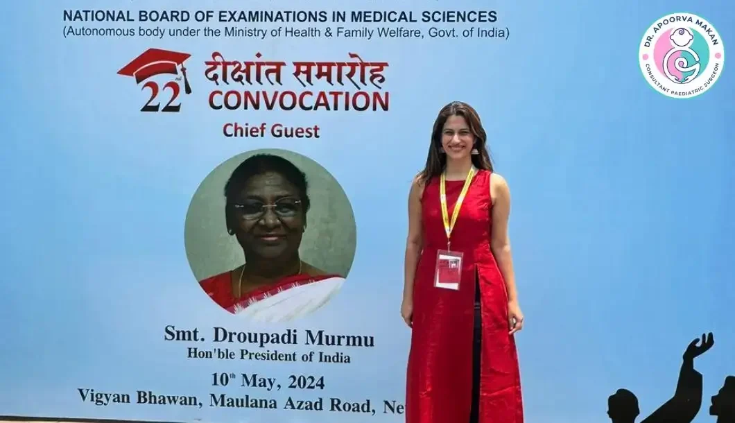 Dr. Apoorva Makan at convocation ceremony with poster of Hon. President of India Smt. Draupadi Murmu at backside.