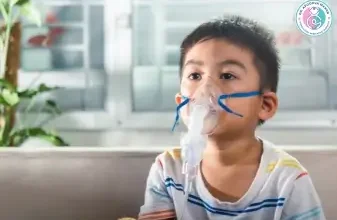 Small kid wearing oxygen mask.